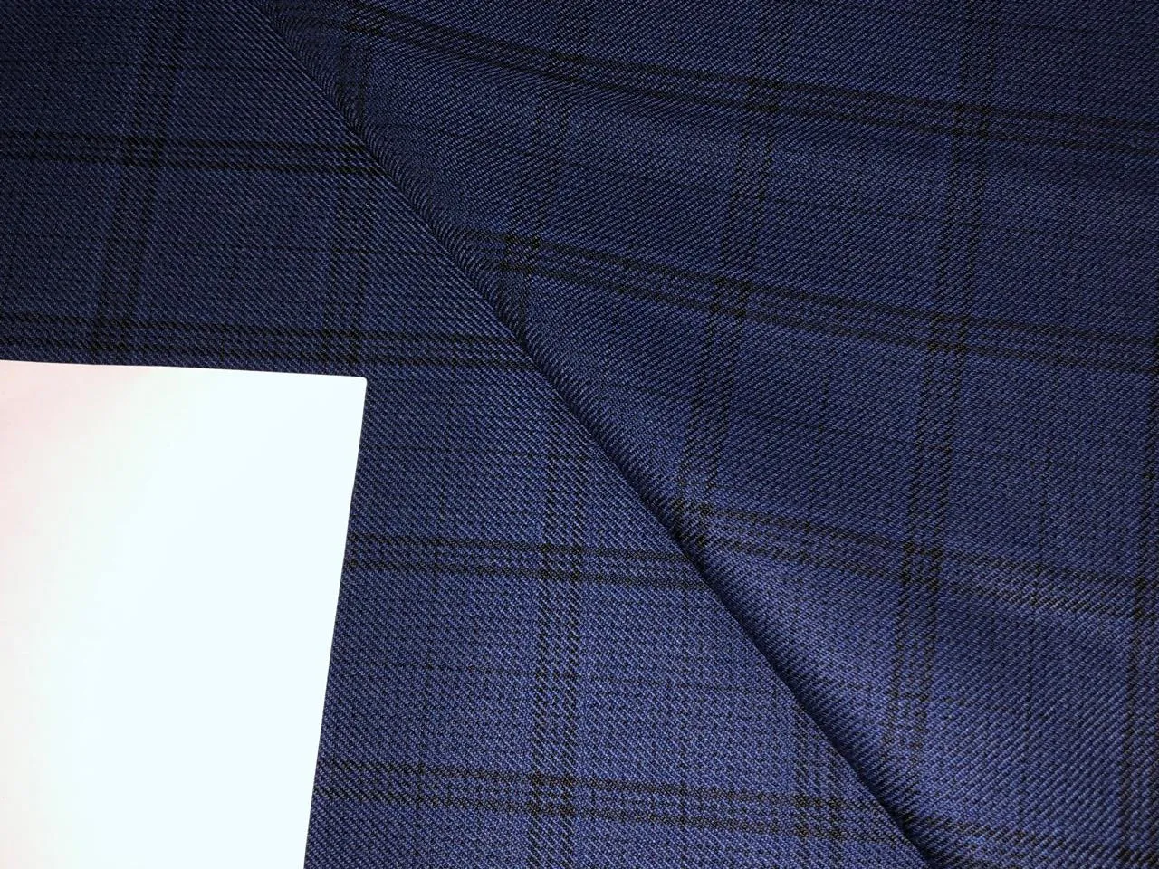 Tweed Suiting Blended With Viscose 58" wide plaids available in 3 colors navy/black, tan brown/tan red and black AND teal/navy
